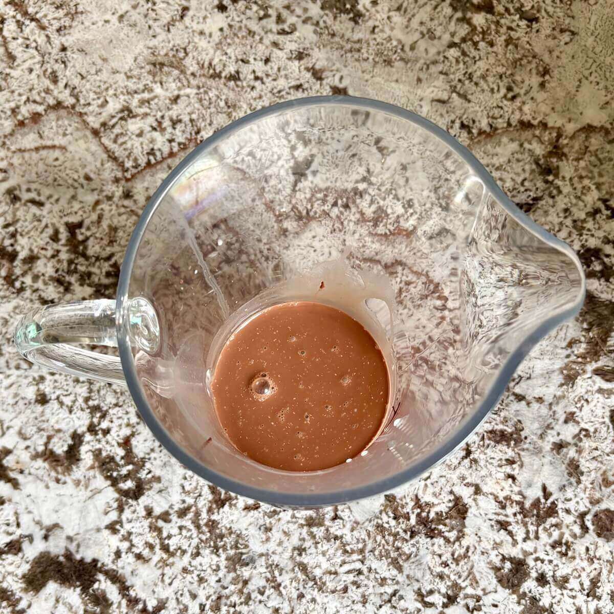 Brown popsicle "batter" in a pitcher.