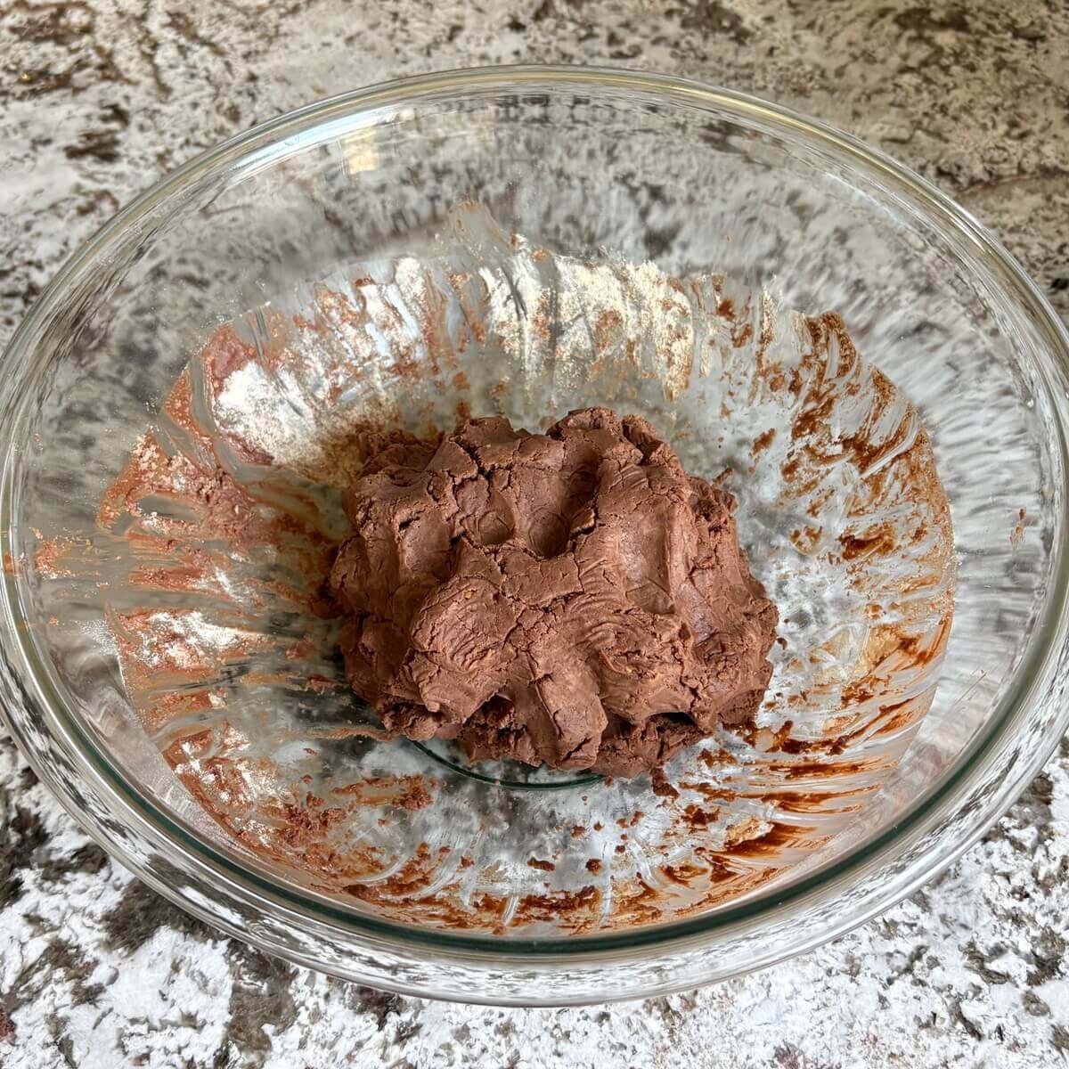 Low-carb dough for protein bars in a mixing bowl.