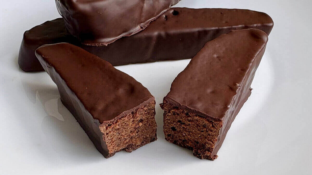 Chocolate covered seitan on a plate.