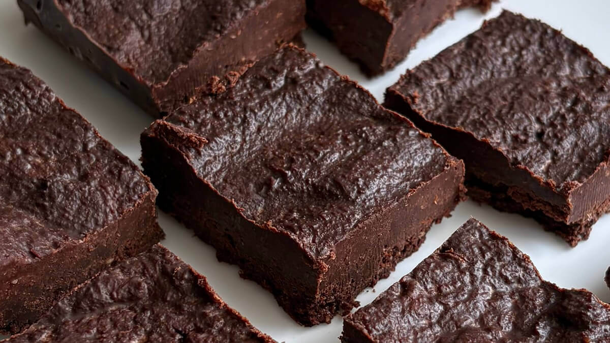 Flaxseed chocolate dessert squares on a plate.