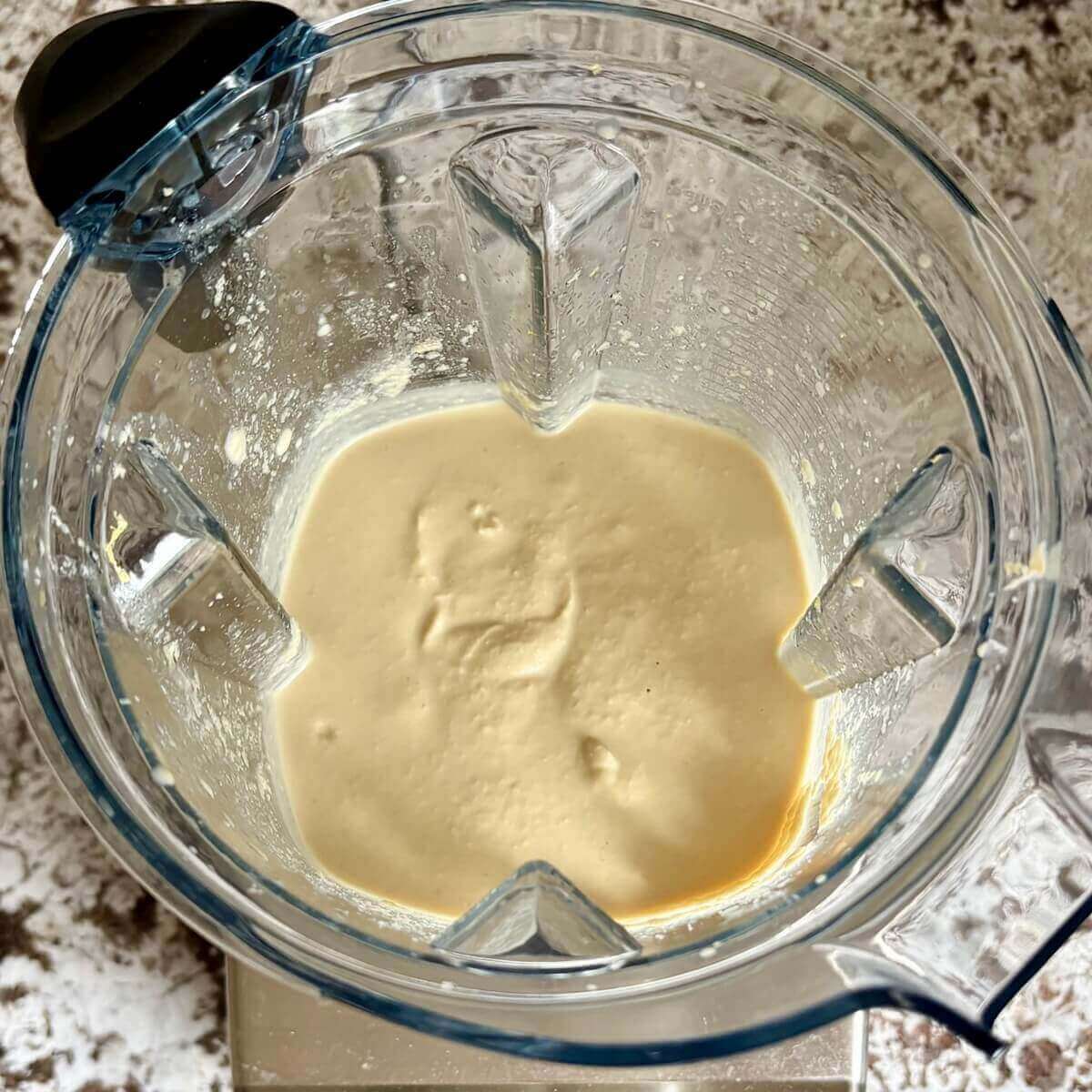 A creamy pasta sauce made out of tempeh in a blender.