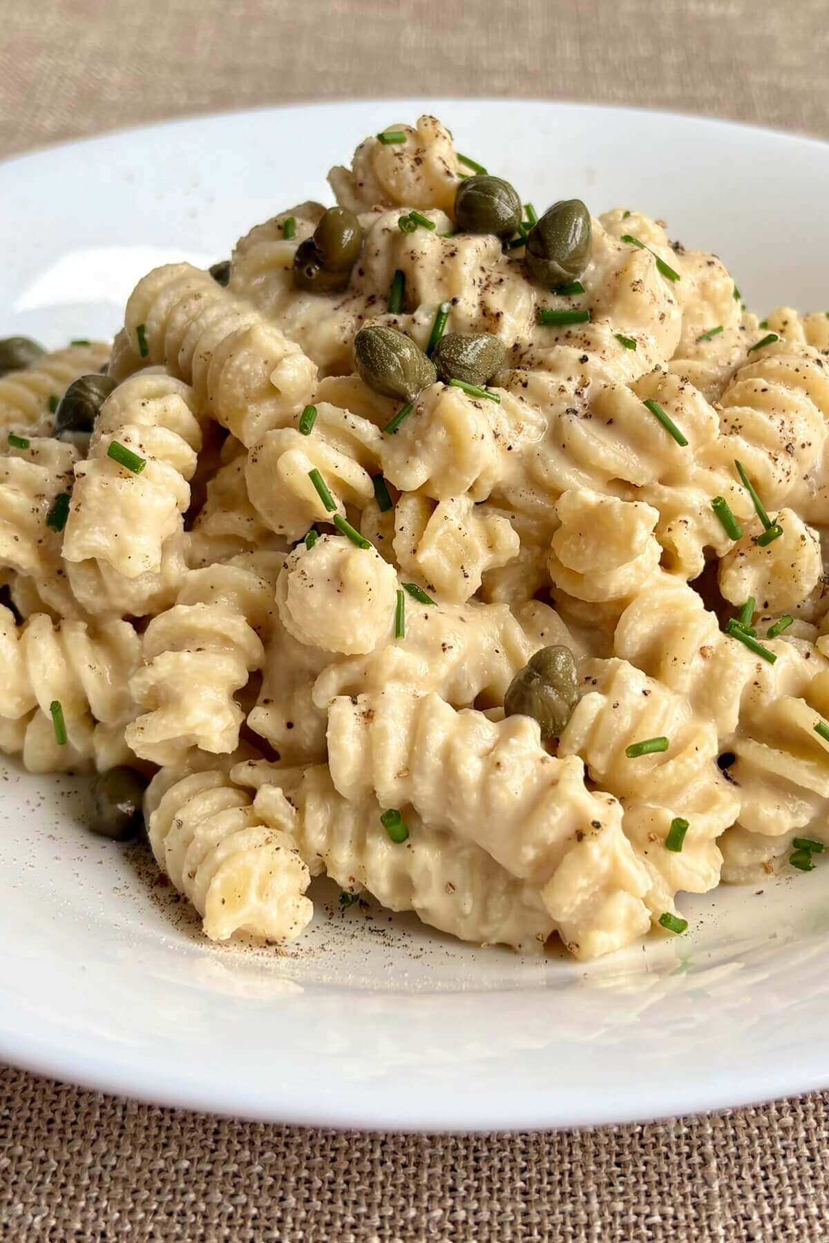 A bowl of creamy fusilli pasta.