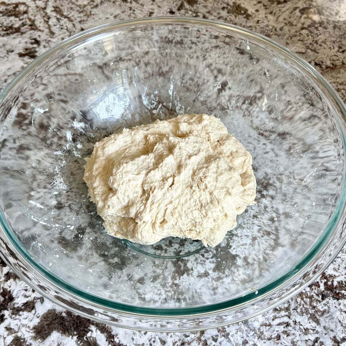 Tofu dough in a glass bowl.
