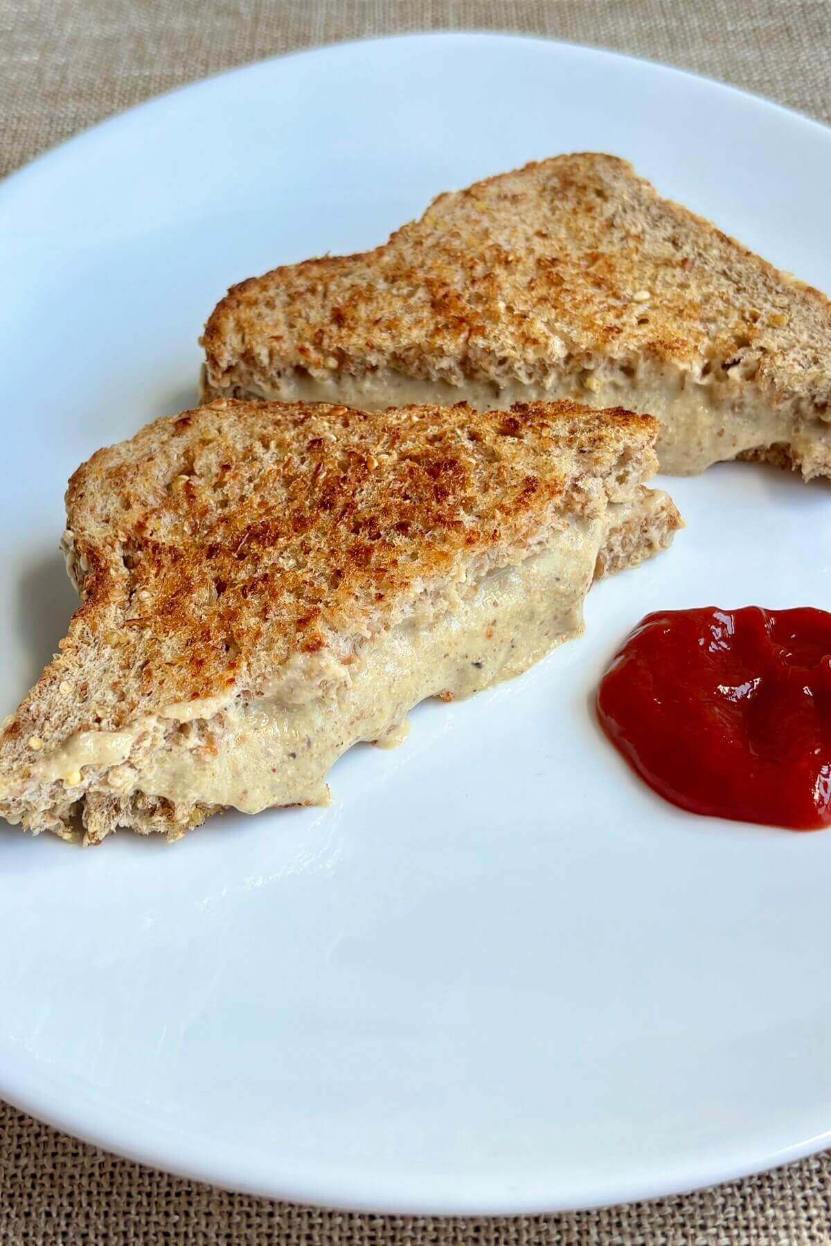 A sandwich oozing with vegan cheese made with chia seeds.