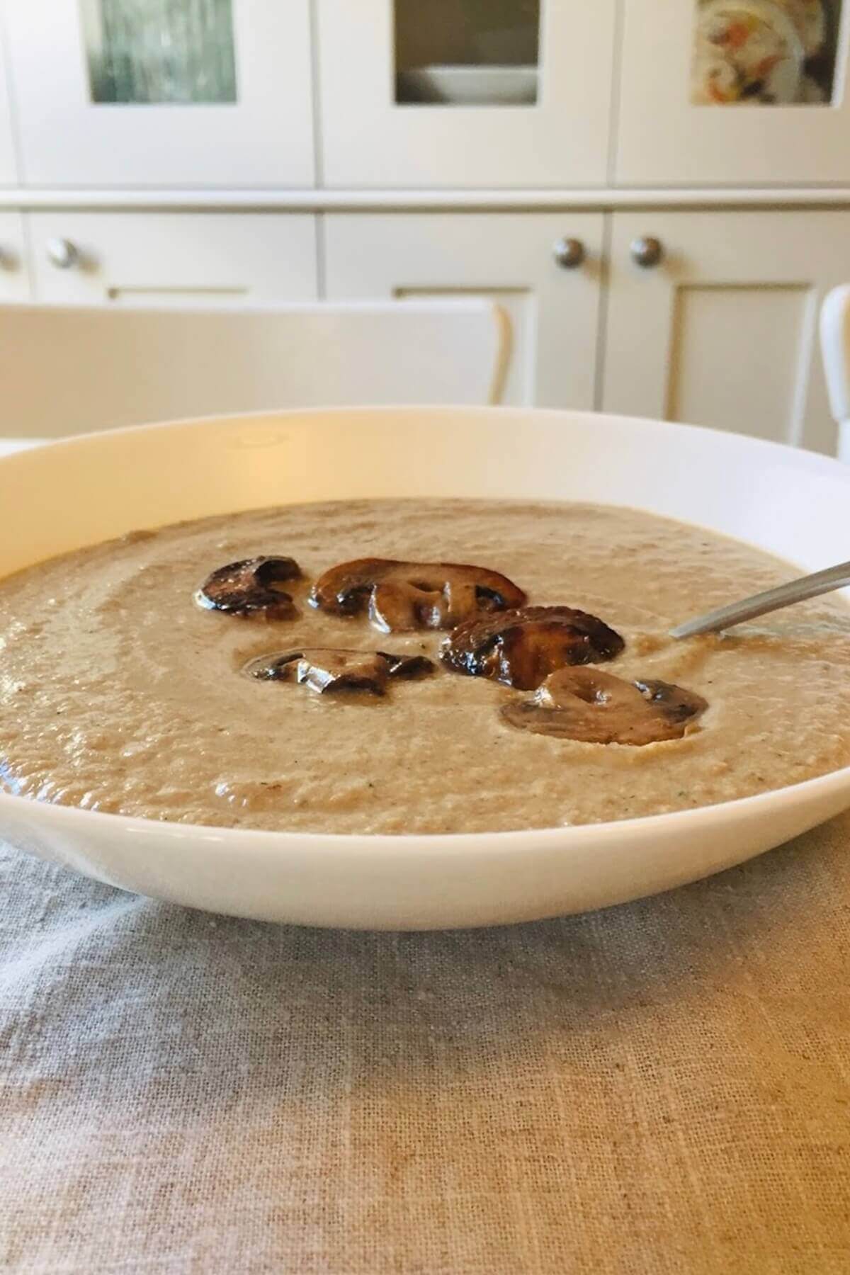 A bowl of creamy vegan mushroom soup.