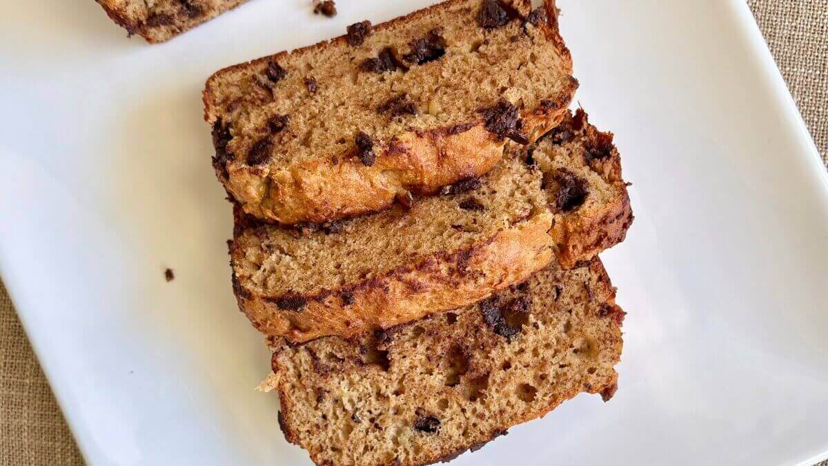 High-protein banana bread slices on a plate.