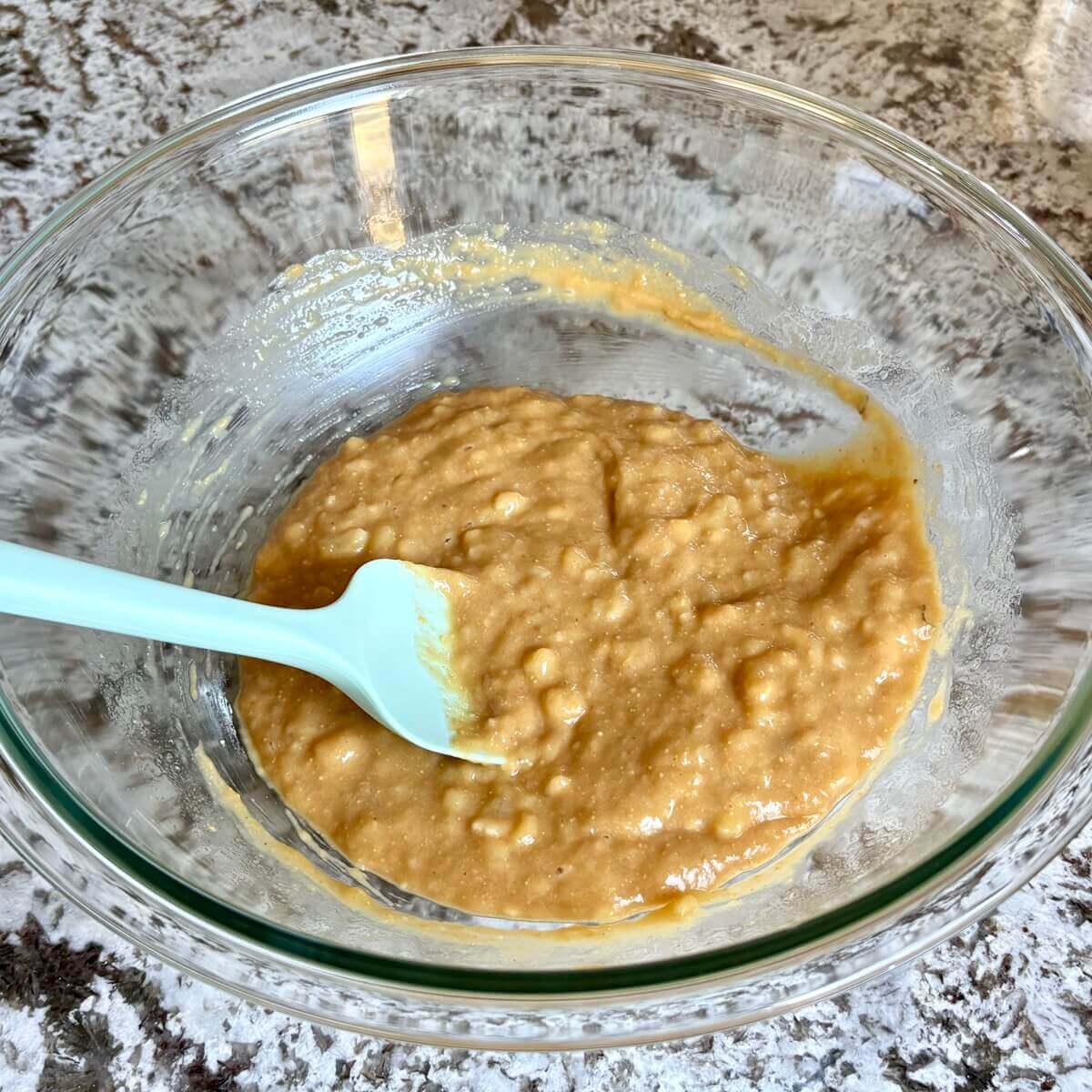 Wet ingredients in a glass bowl.